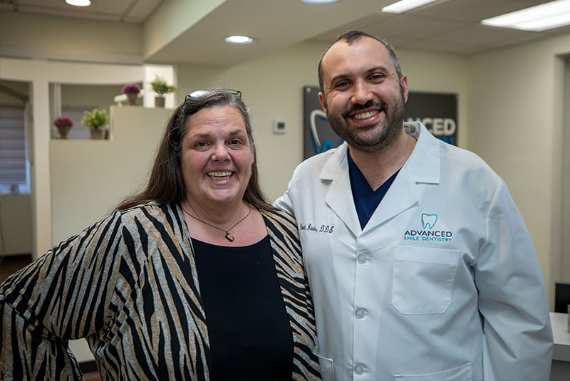 doctor Basar with his dental implants patient