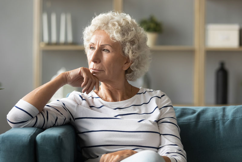 Patient Thinking About Her Dental Implant Options